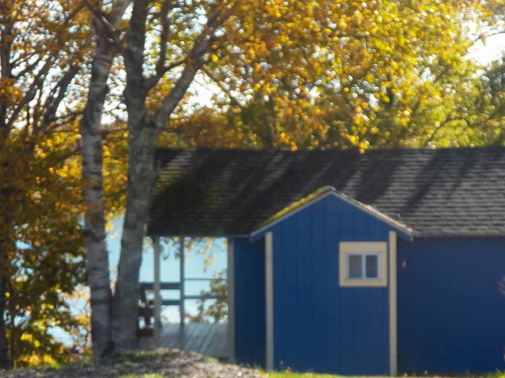 One of the blue rental cottages at SEAVIEW CAMPGROUND & COTTAGES
