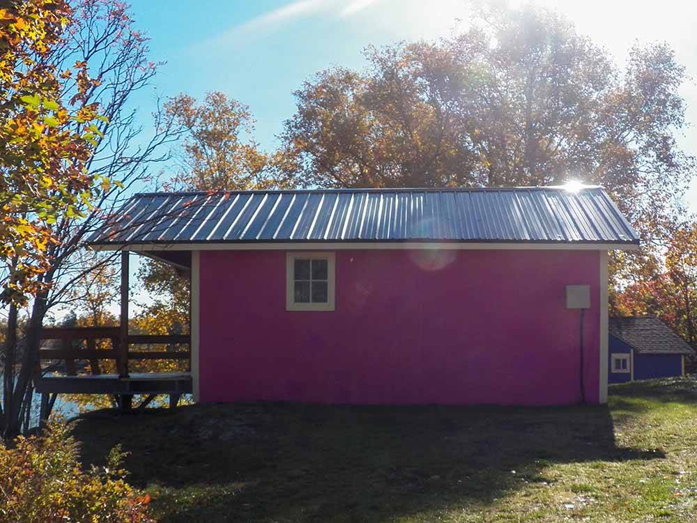 The magenta colored rental cottage at SEAVIEW CAMPGROUND & COTTAGES