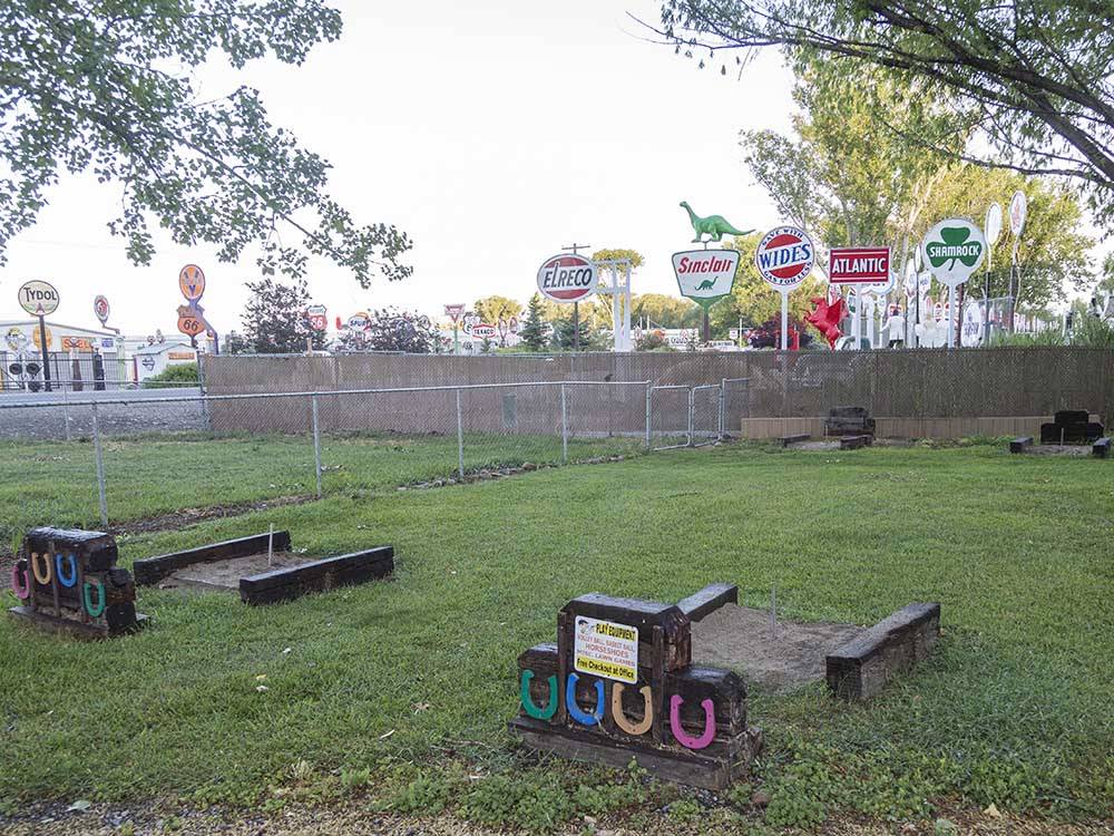 The horseshoe pits with colorful horseshoes at LAKESIDE RV CAMPGROUND