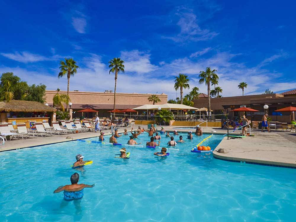 People swimming in the pool at VALLE DEL ORO RV RESORT