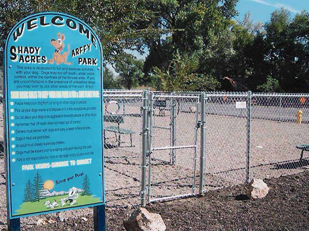 Large fenced play area for pets at SHADY ACRES RV PARK
