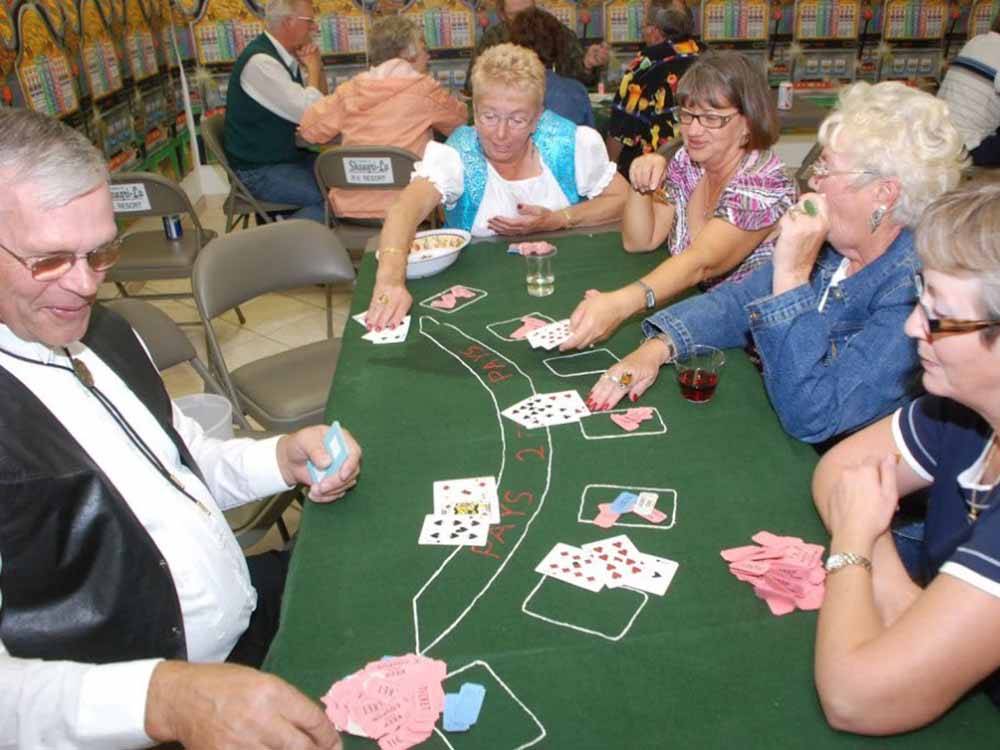 People playing blackjack at SHANGRI-LA RV RESORT