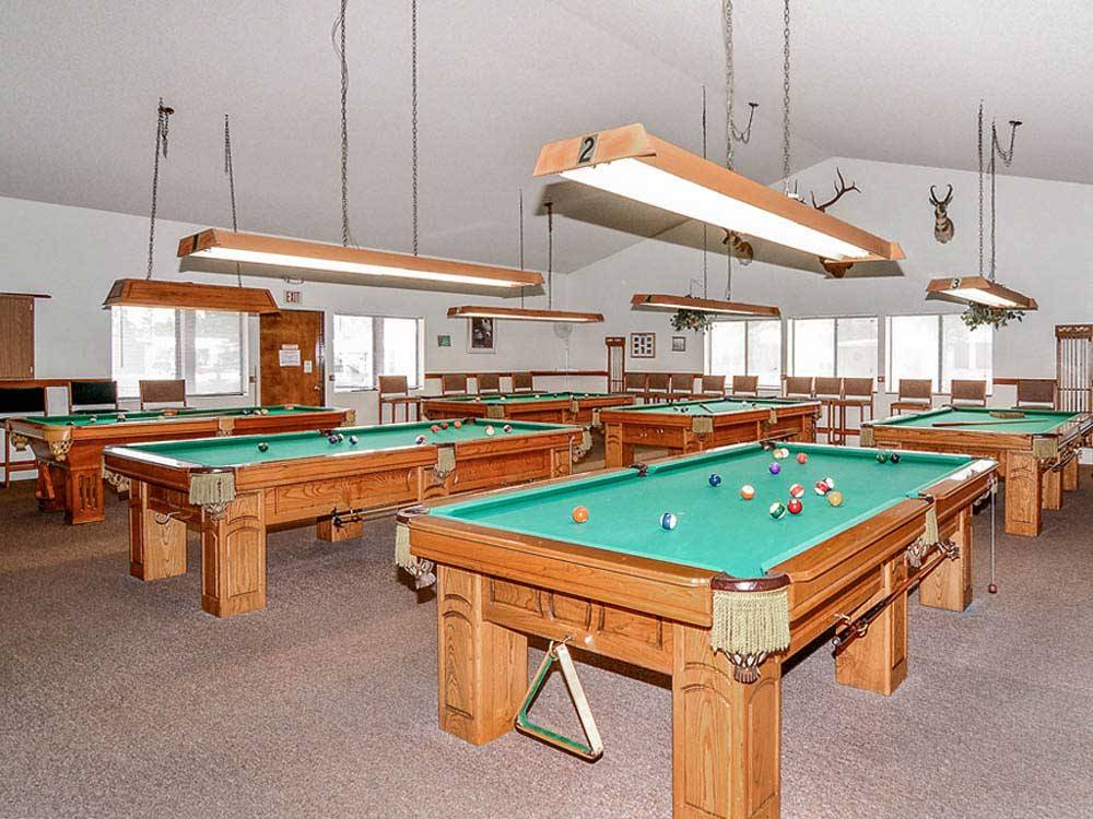 Pool tables in game room at ENCORE VENTURE IN