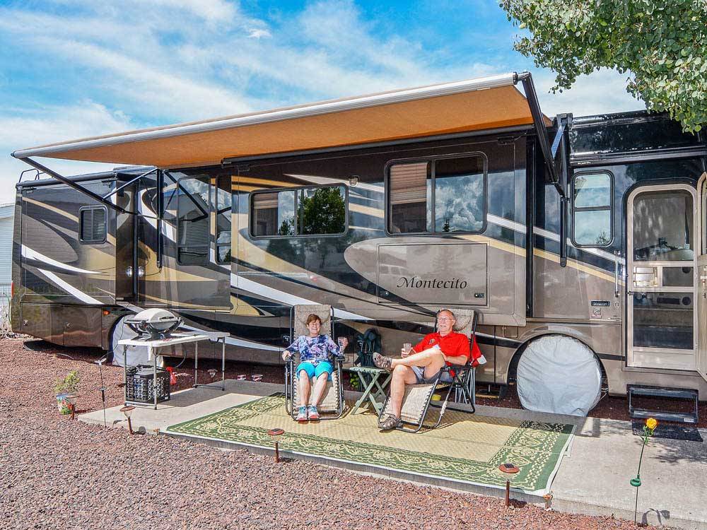 Couple camping in RV at ENCORE VENTURE IN