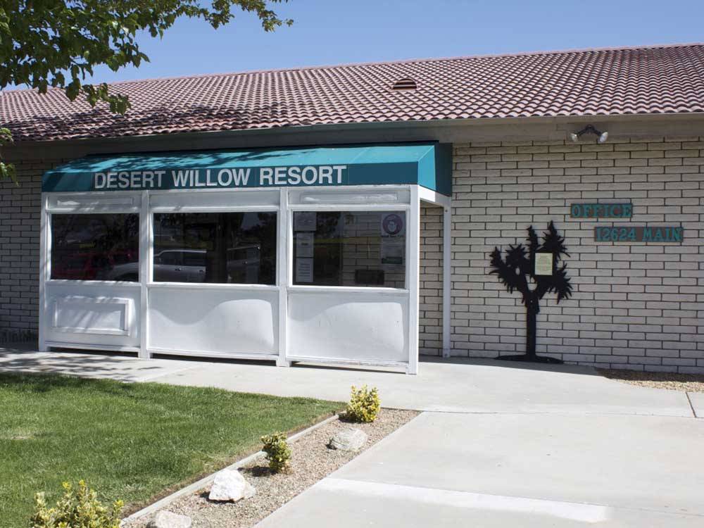 The front entrance building at DESERT WILLOW RV RESORT