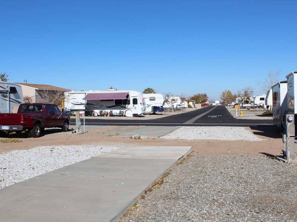 A group of concrete pad RV sites at DESERT WILLOW RV RESORT