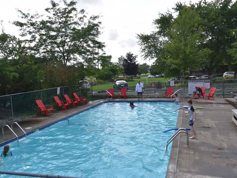 Kids enjoying the swimming pool at CAMPARK RESORTS FAMILY CAMPING & RV RESORT
