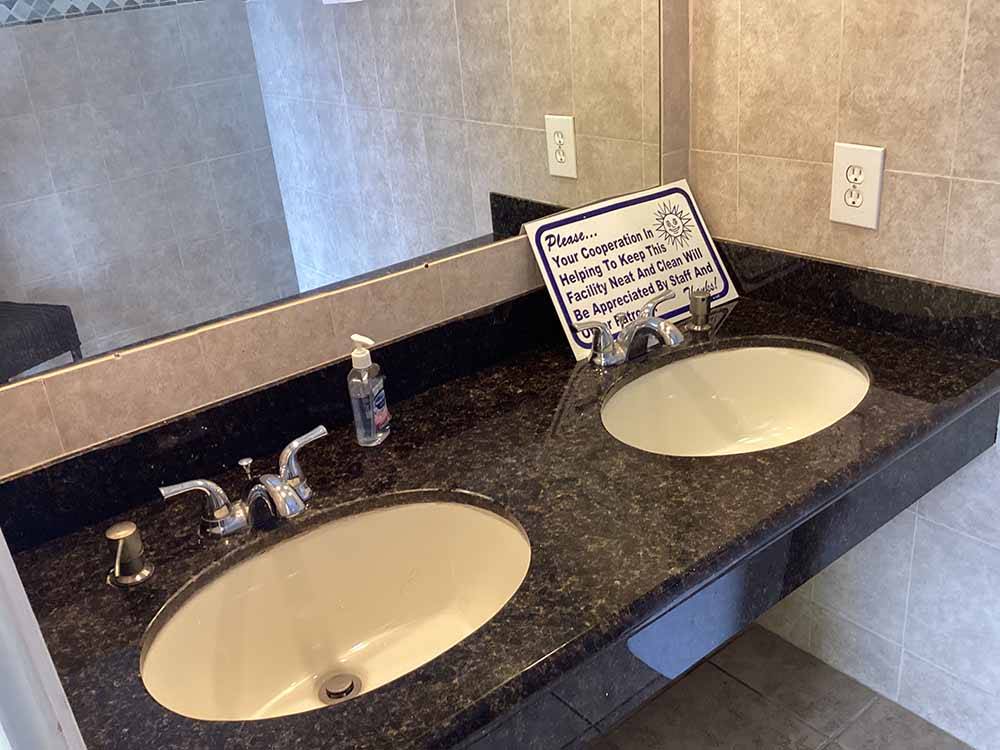 The clean bathroom sinks at JUDE TRAVEL PARK OF NEW ORLEANS