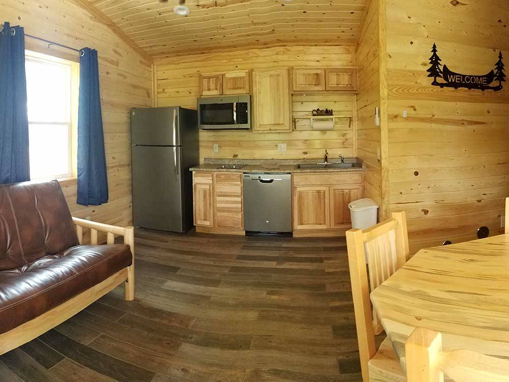 The inside of the rental cabin at CAMELOT CAMPGROUND QUAD CITIES