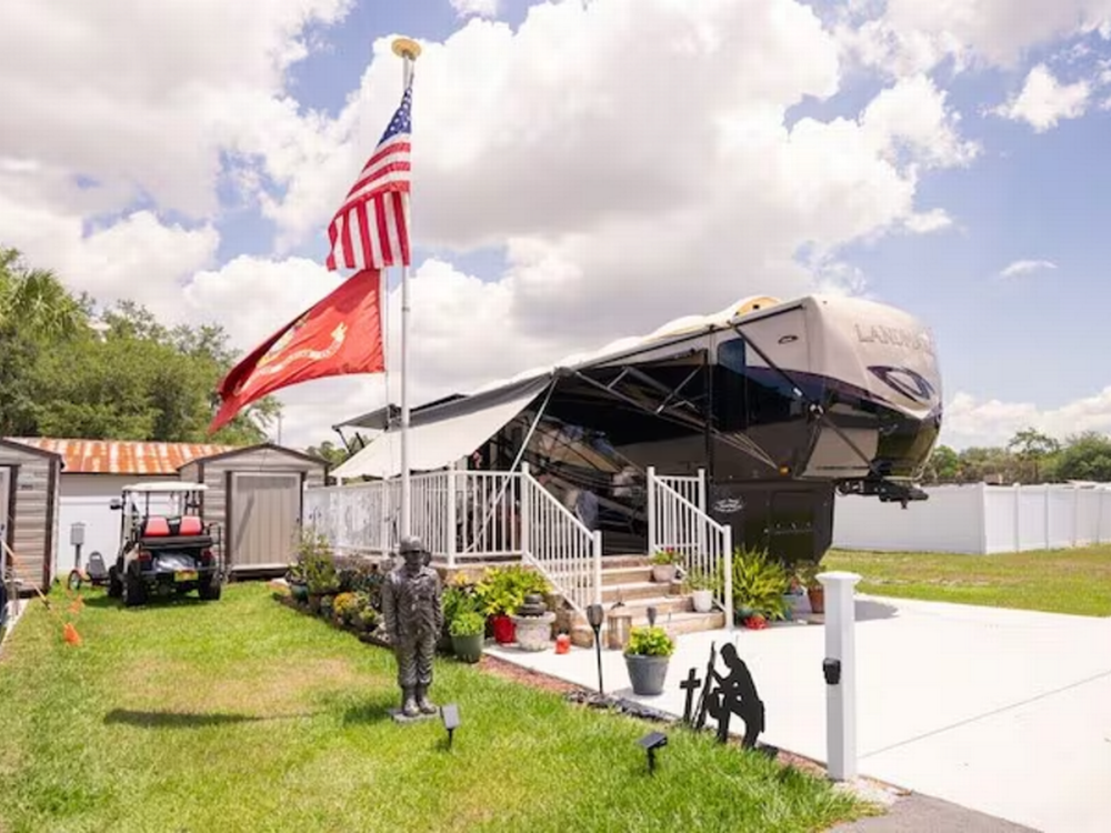 Flag next to site Settler's Rest Sun RV Communities