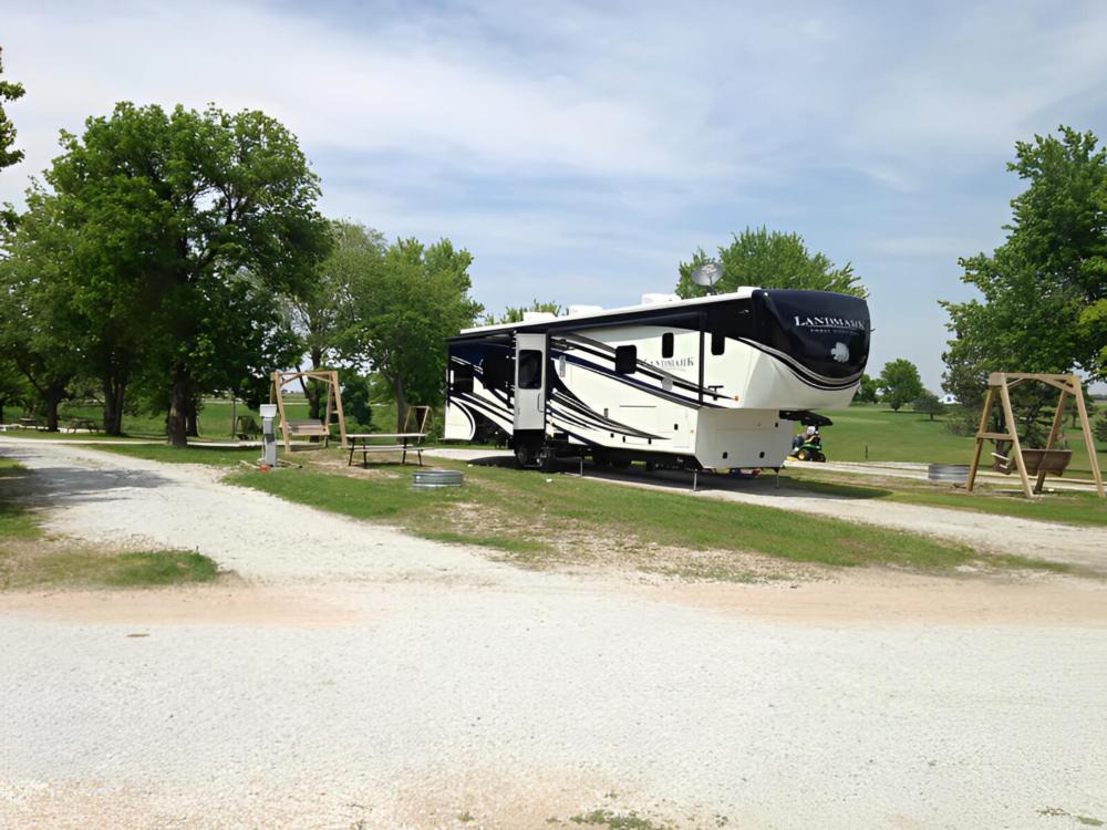 Parked RV at site Double Nickel Campground