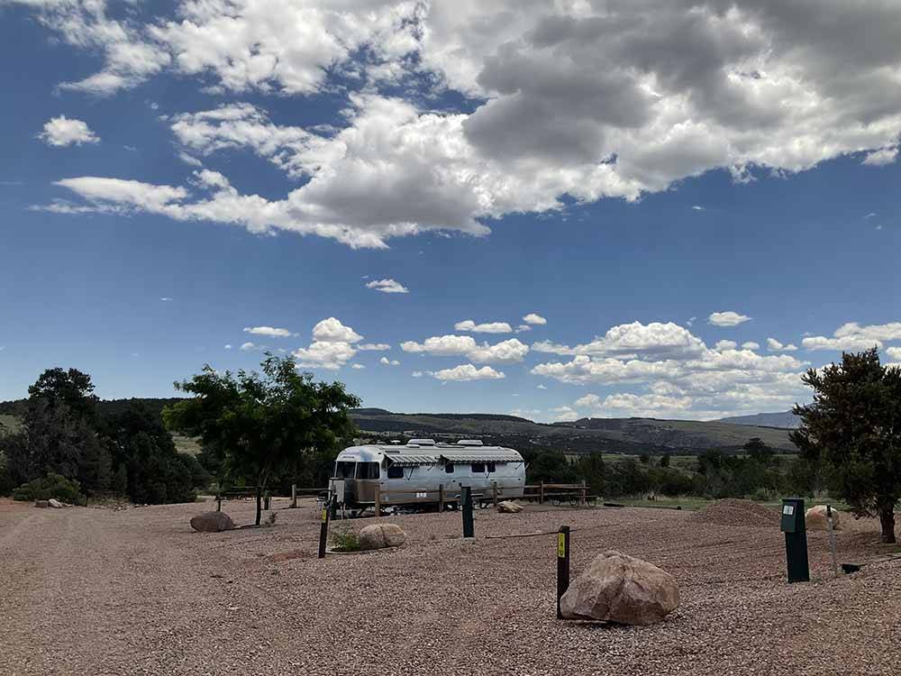Airstream in campsite with hills in background at ROYAL VIEW RV PARK