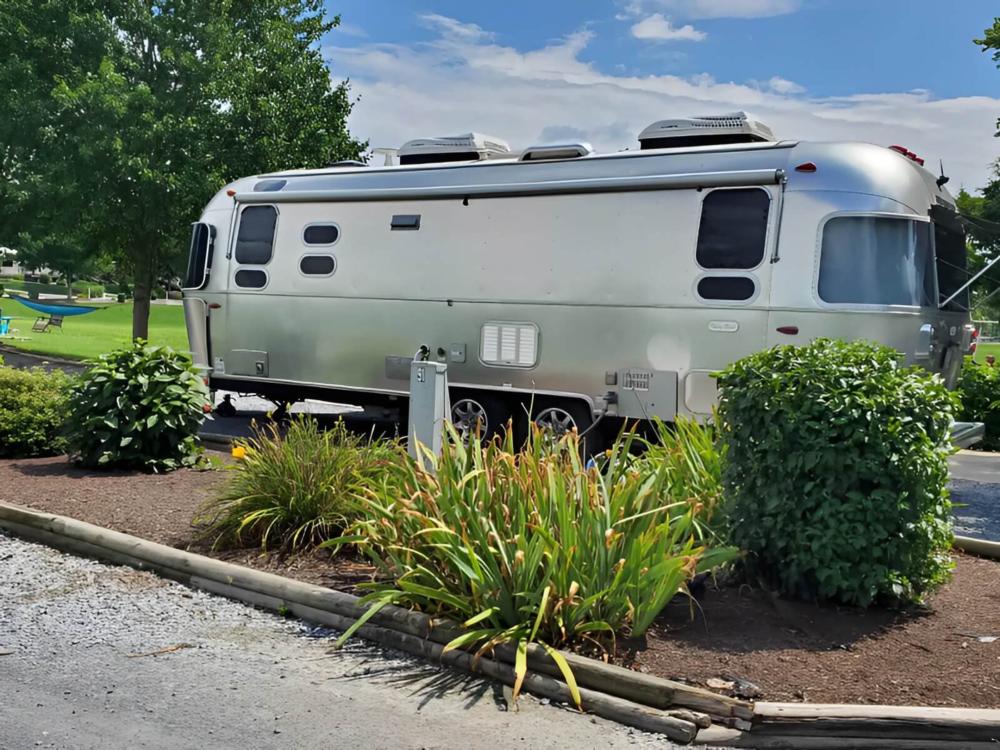 Parked camper at site Spacious Skies Shenandoah Views