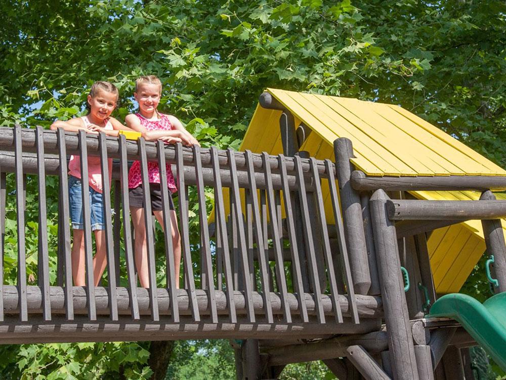 Two girls in the playground at RENFRO VALLEY KOA HOLIDAY