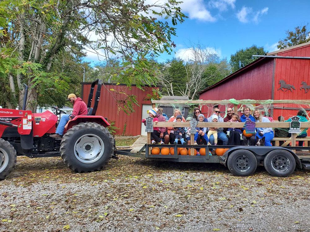 Families on tractor/wagon ride in fall at RENFRO VALLEY KOA HOLIDAY