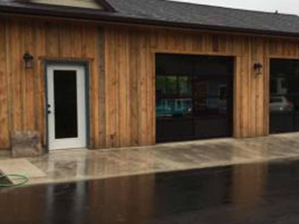 Exterior of clubhouse for guests at WOAHINK LAKE RV RESORT