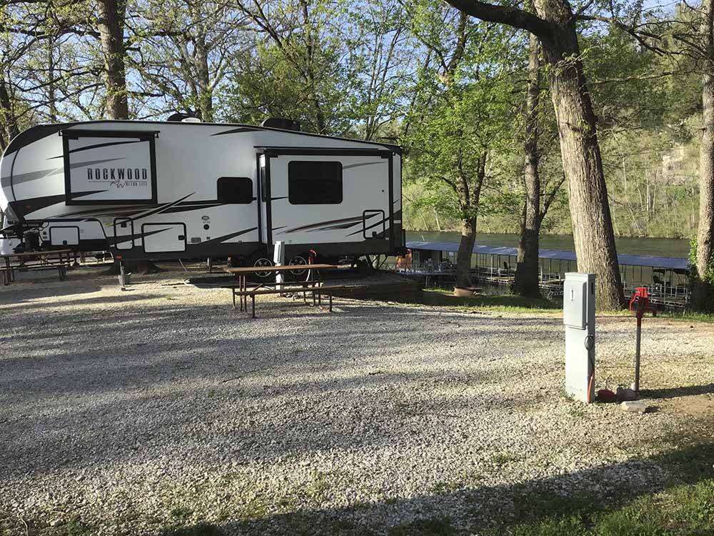 RV sites by the water at COOPER CREEK RESORT & CAMPGROUND