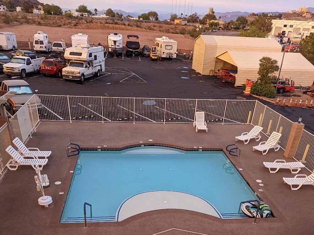 The RV sites by the pool at CANYON TRAIL RV PARK
