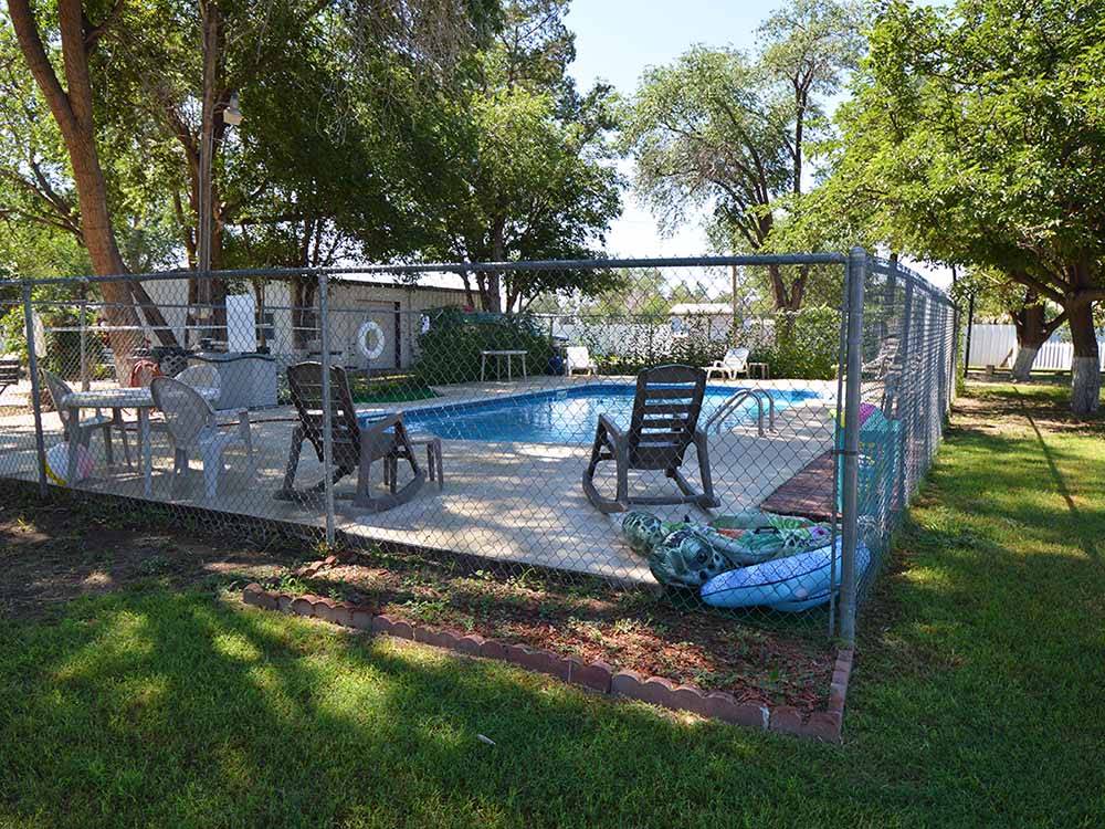 The fenced in swimming pool at LUBBOCK RV PARK