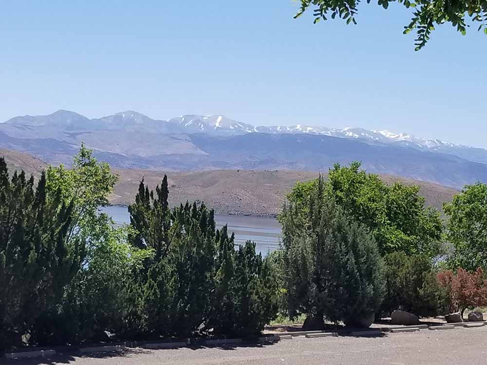 Overview of the trees, river and mountain view at TOPAZ LODGE RV PARK & CASINO