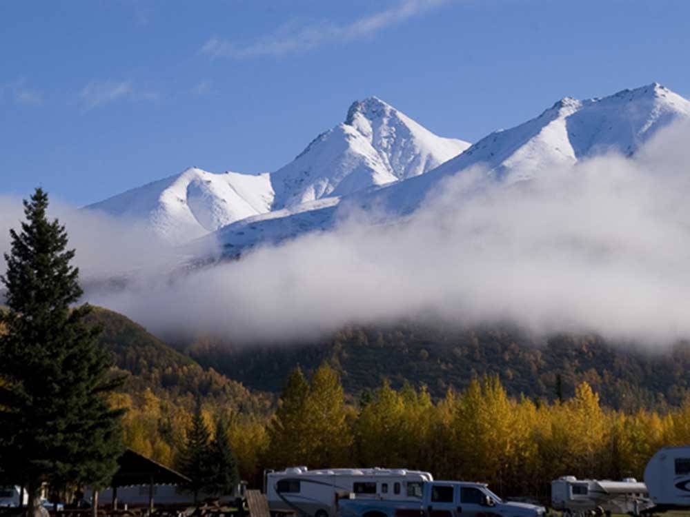 Snow-capped mountains thru the clouds at MOUNTAIN VIEW RV PARK