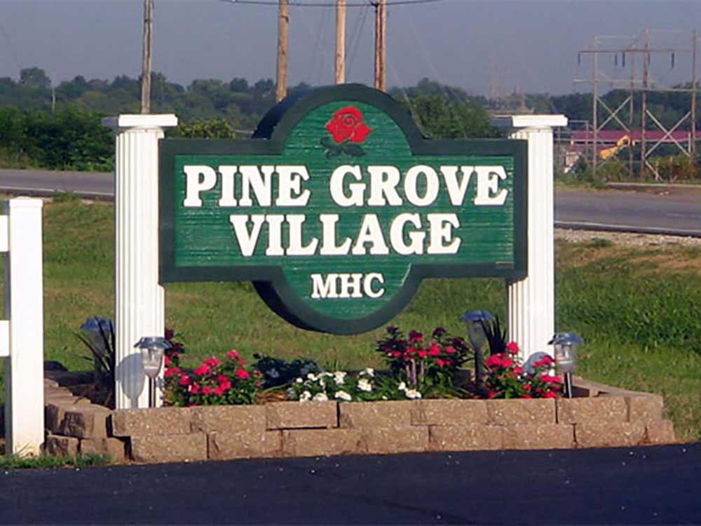 The front entrance sign at PINE GROVE MHC & RV COMMUNITY