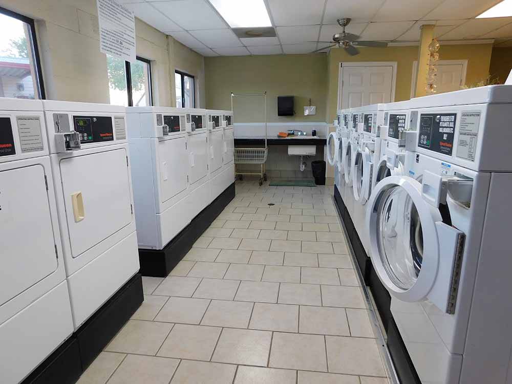 Inside the clean laundry room at FIG TREE RV RESORT
