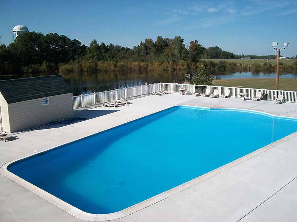 Swimming pool with outdoor seating at PICTURE LAKE CAMPGROUND