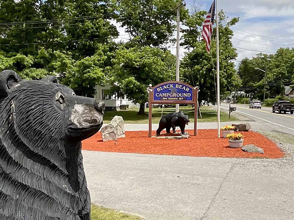 The front entrance sign and bear statues at BLACK BEAR CAMPGROUND