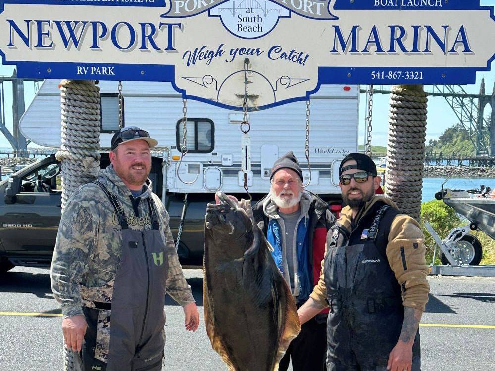 Fishermen showing off their catch-of-the-day