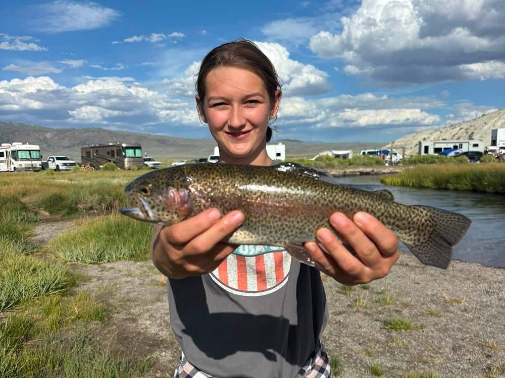 Girl holding a fish