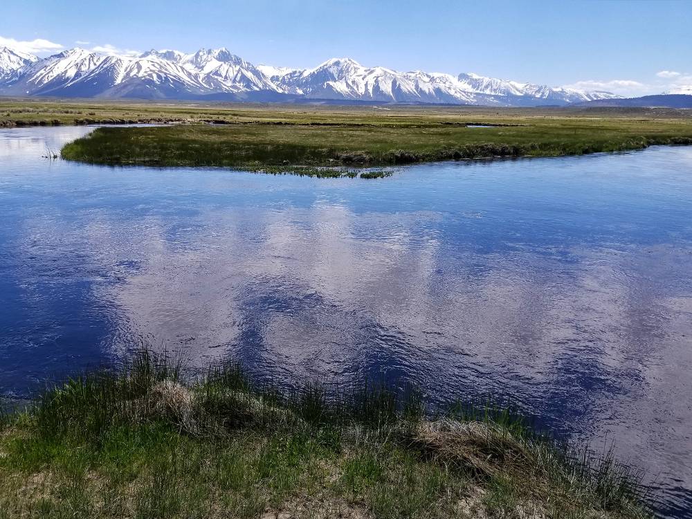 Mountains by the water
