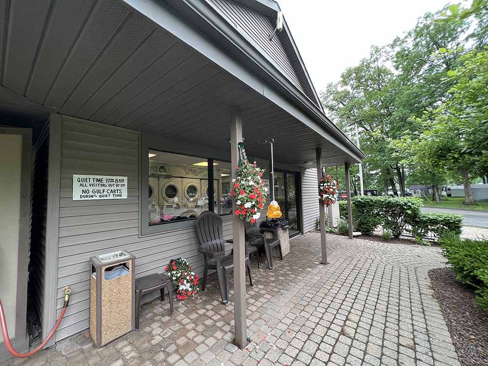 The front patio at the laundry building at CAMP LORD WILLING RV PARK & CAMPGROUND