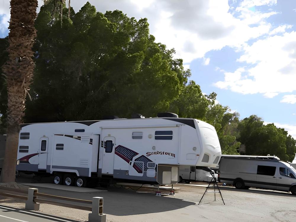 White trailer at Rivers Edge RV Resort