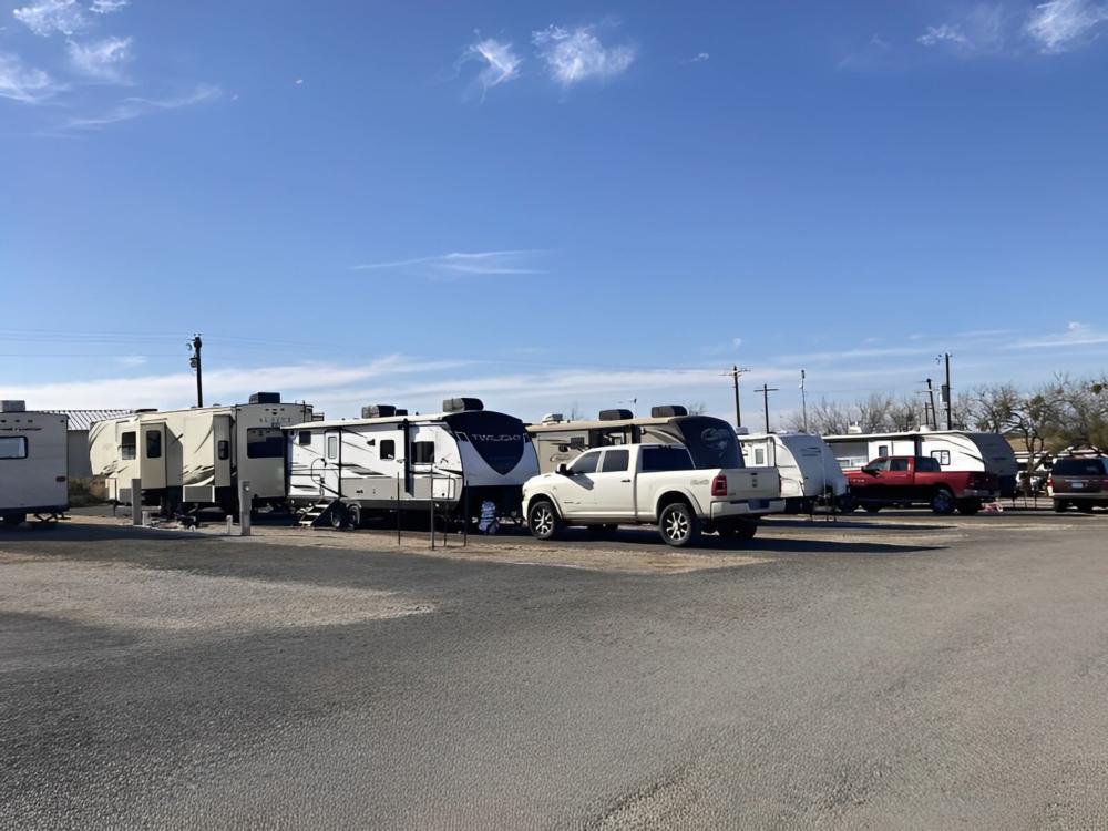 Parked trailers at site Tye RV Park