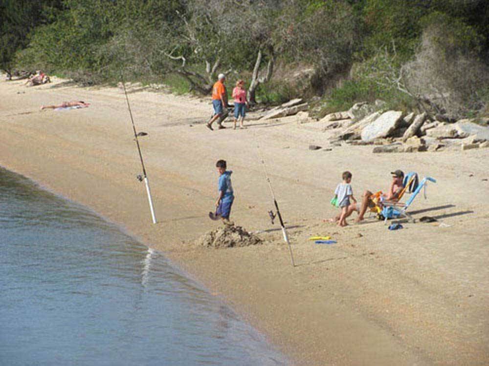 People fishing at NORTH BEACH CAMP RESORT