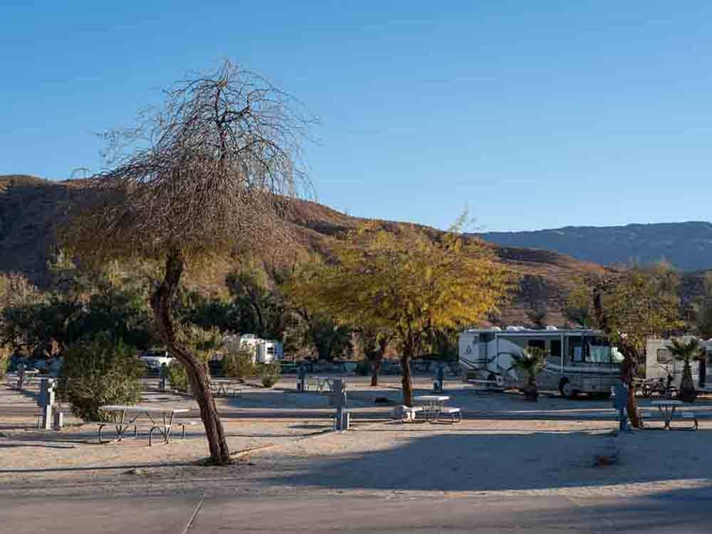 A group of dirt RV sites at PALM CANYON HOTEL AND RV RESORT