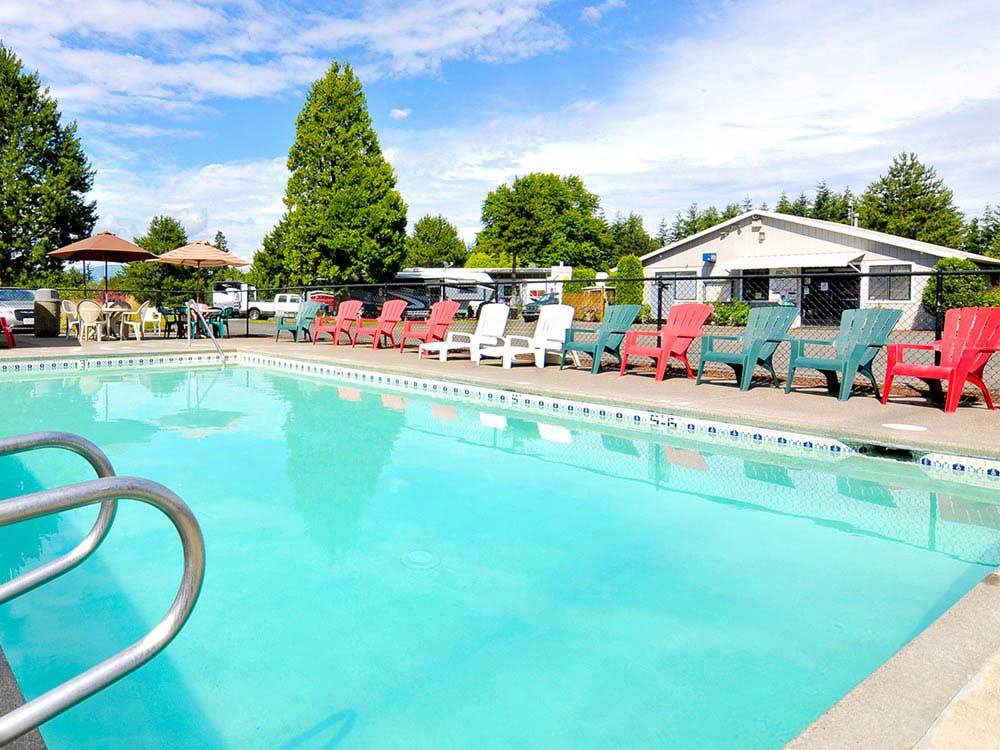 Swimming pool with outdoor seating at PORTLAND FAIRVIEW RV PARK
