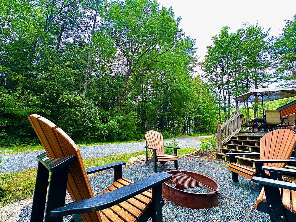 Seating around a fire ring at site