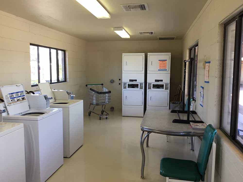 The clean laundry room at ADOBE RV PARK