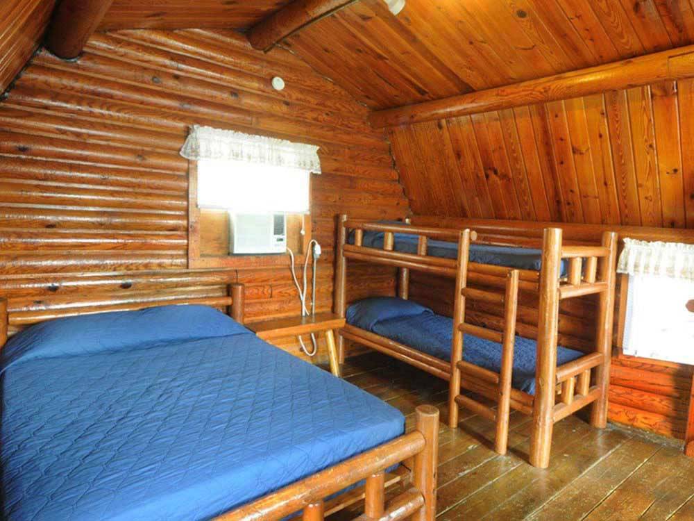 Interior bedroom at private cabin at MEMPHIS GRACELAND RV PARK & CAMPGROUND