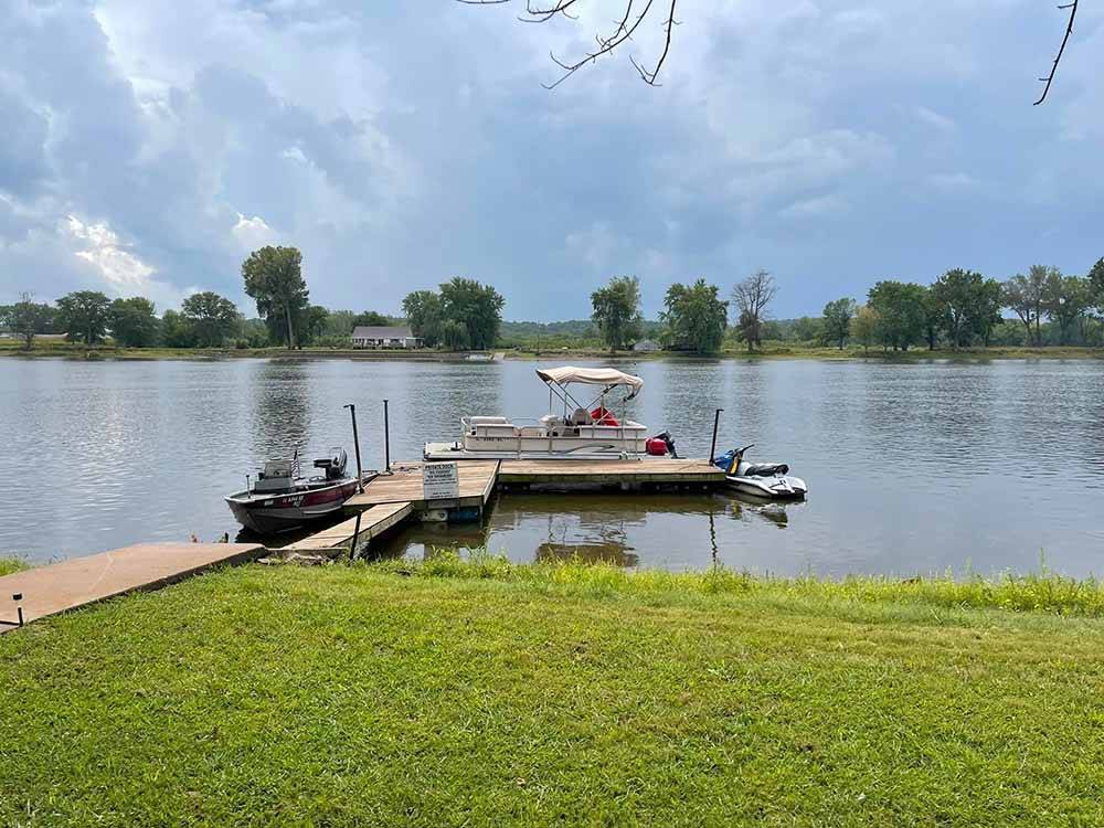 A view of the river dock with boats at LUNDEEN'S LANDING