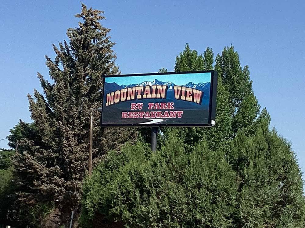 The front billboard in trees at MOUNTAIN VIEW RV PARK