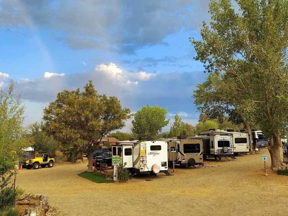 RVs occupy the grounds at CANYONS OF ESCALANTE RV PARK