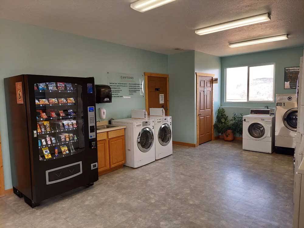 Laundry machines and a vending machine at CANYONS OF ESCALANTE RV PARK
