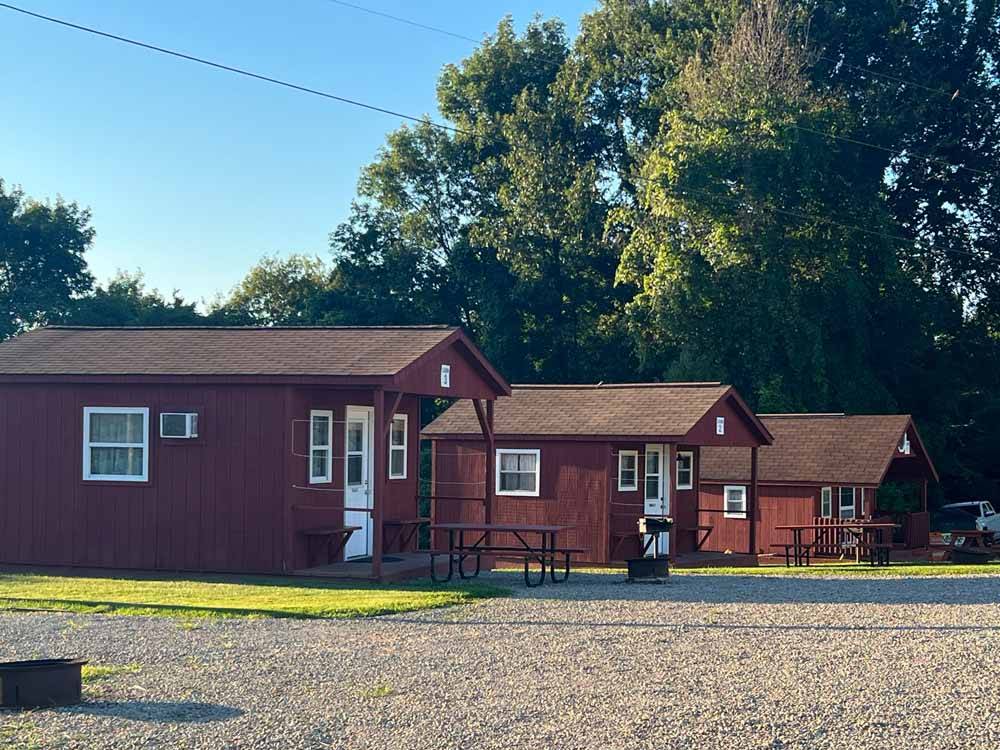 A row of rental cabins at WOLFIES CAMPGROUND