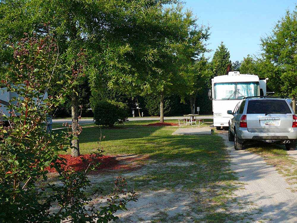 A motorhome in one of the RV sites at BARNYARD RV PARK