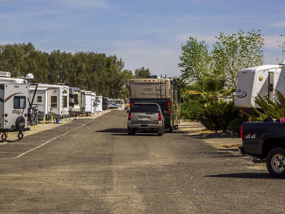Class A Motorhome driving to camping spot at TWENTYNINE PALMS RESORT RV PARK AND COTTAGES