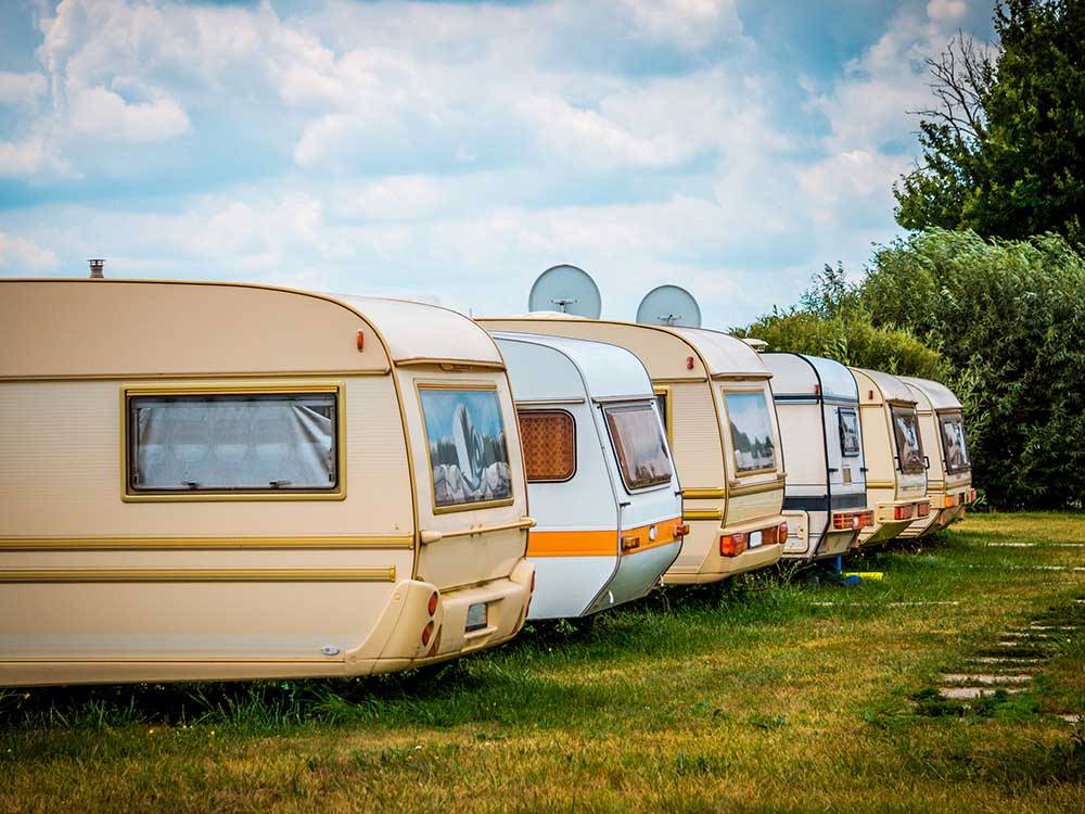 A row of vintage trailers at TRAILER LANE CAMPGROUND