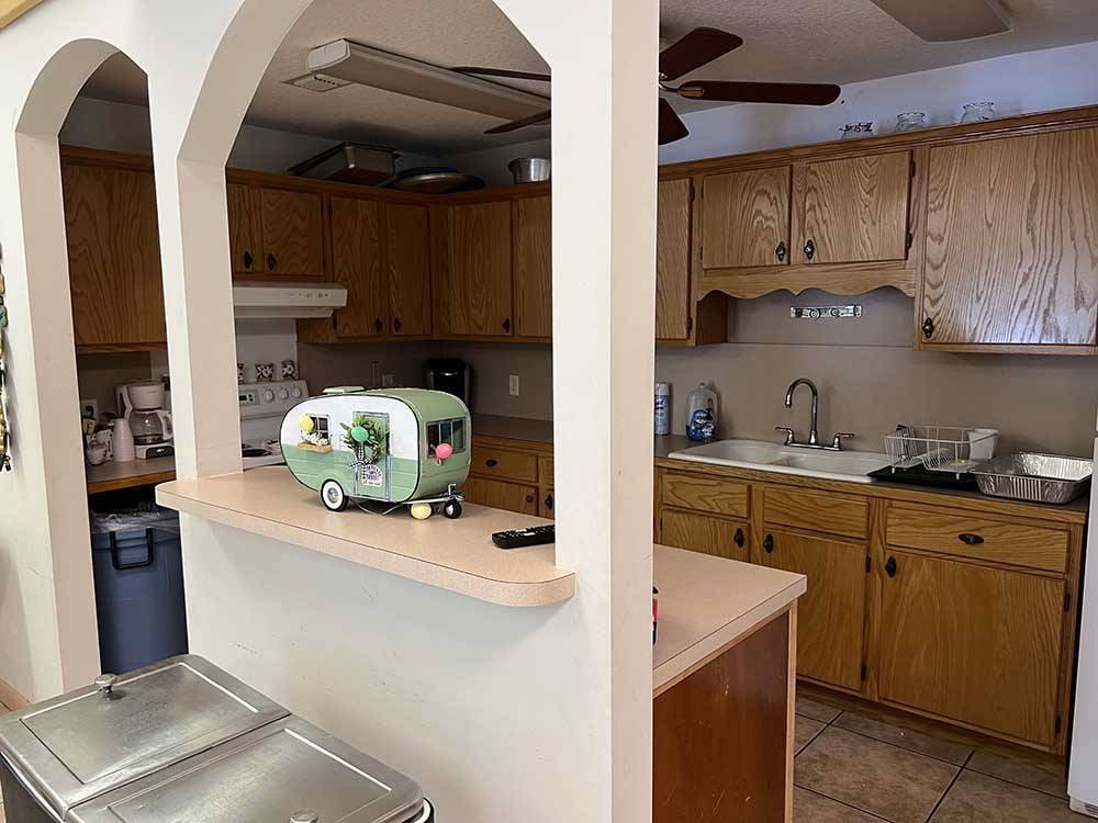 Kitchen with motorhome model on counter at KELLY'S COUNTRYSIDE RV PARK